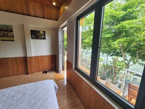Quadruple Room, Lake View | Minibar, in-room safe, desk, blackout curtains - Restful River Bungalow (Bo Trach)