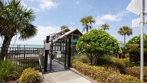 A gated entrance with a sign reading "Emerald Shores."