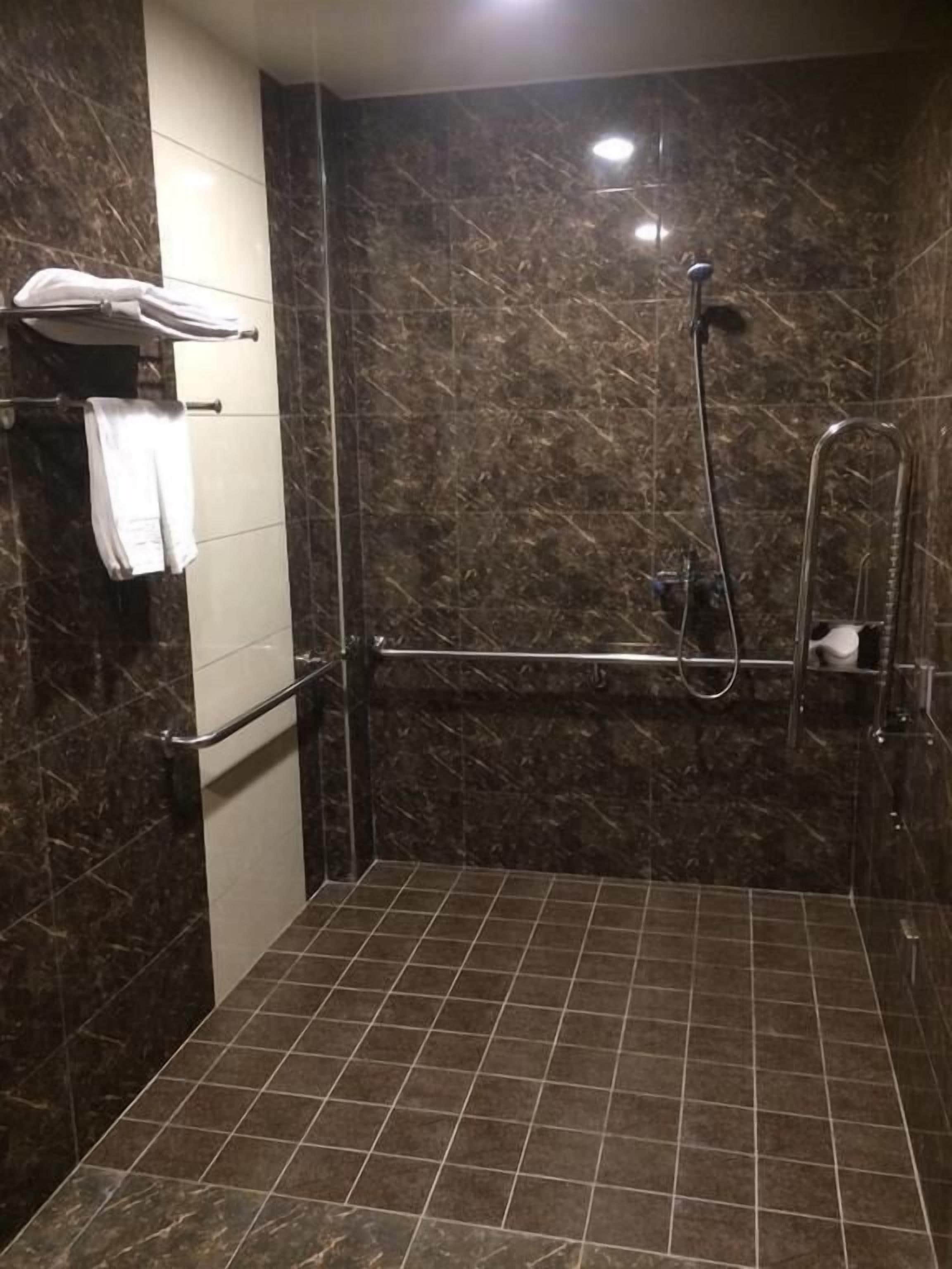 Double Room, Accessible, Non Smoking | Bathroom | Shower, free toiletries, hair dryer, slippers