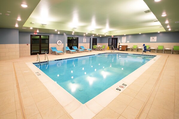 Indoor pool, open 9:00 AM to 10:00 PM, pool loungers