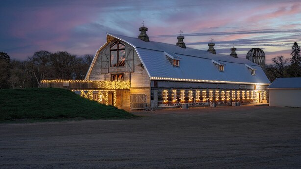 A barn with a sloped roof, multiple chimneys, and a large door. - Elroy's @ Big Rock Creek: Where Adventure Meets Comfort in the St. Croix Valley (Saint Croix Falls)