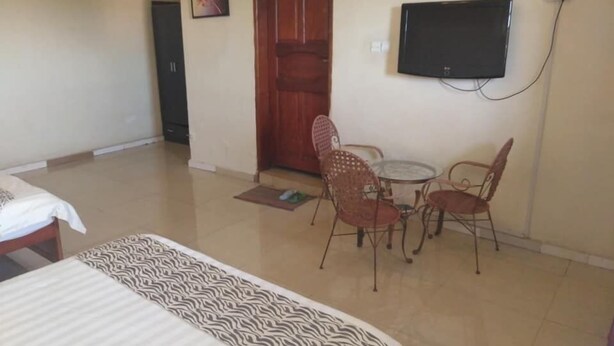 Twin Room | Premium bedding, desk, WiFi (free), bed sheets - Central View Hotel (Kampala)