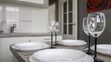 Apartment | Private kitchen | Full-sized fridge, oven, stovetop, electric kettle