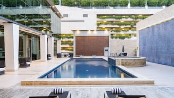 Indoor pool, outdoor pool, open 9:00 AM to 9:00 PM, pool loungers