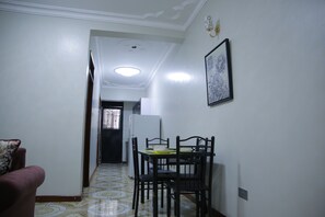 Apartment, 1 Bedroom | Living area | Flat-screen TV - Crystal Hotel Apartments Entebbe (Entebbe)