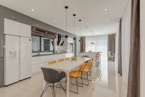Design Villa, Fireplace, Sea View | Private kitchen | Full-size fridge, microwave, oven, stovetop