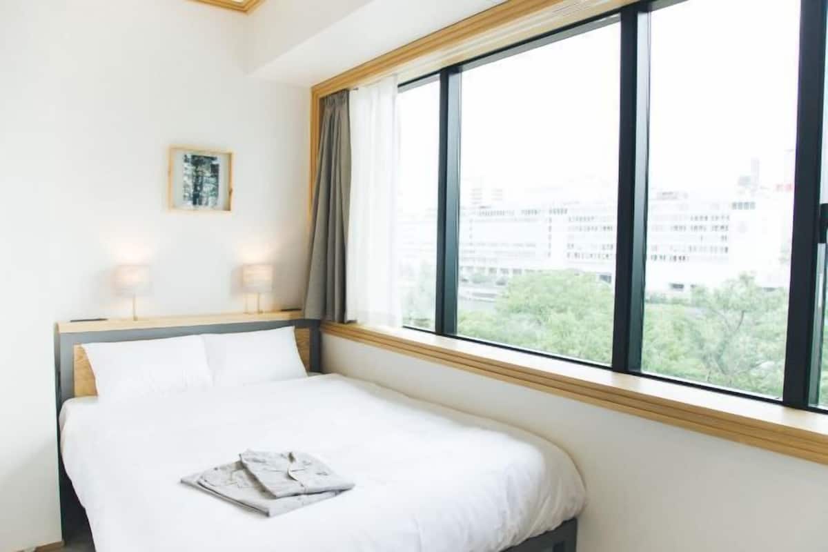 1 bedroom, desk, blackout curtains, iron/ironing board