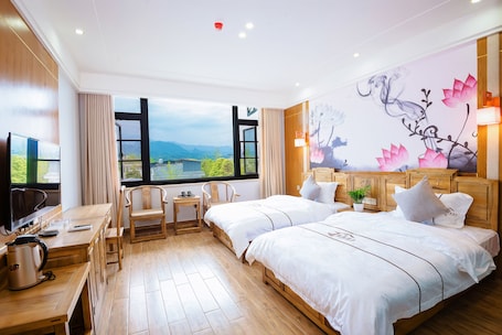 Deluxe Twin Room, Hill View | Desk, blackout drapes, soundproofing, free WiFi