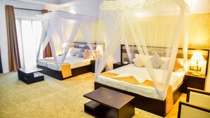 Quarto quádruplo standard, várias camas | Roupas de cama premium, Wi-Fi de cortesia, roupa de cama