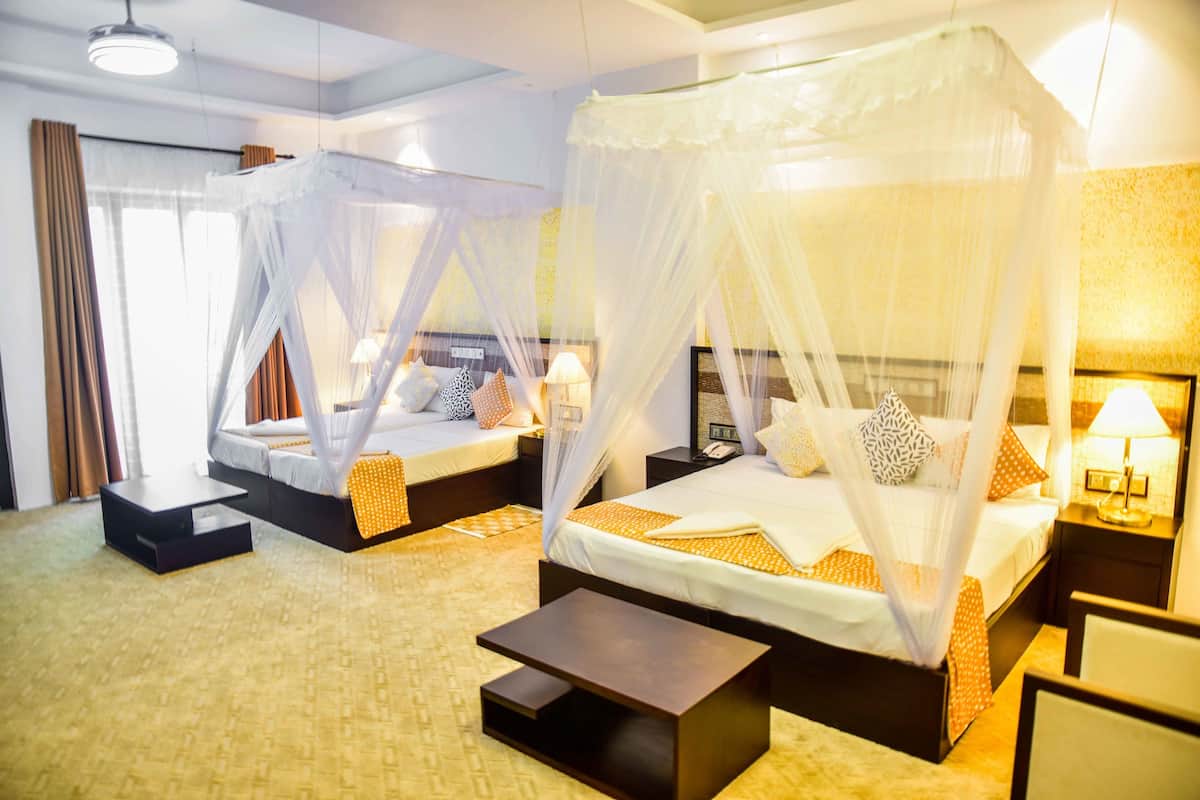 Habitación cuádruple estándar, varias camas | Ropa de cama de alta calidad, wifi gratis y ropa de cama
