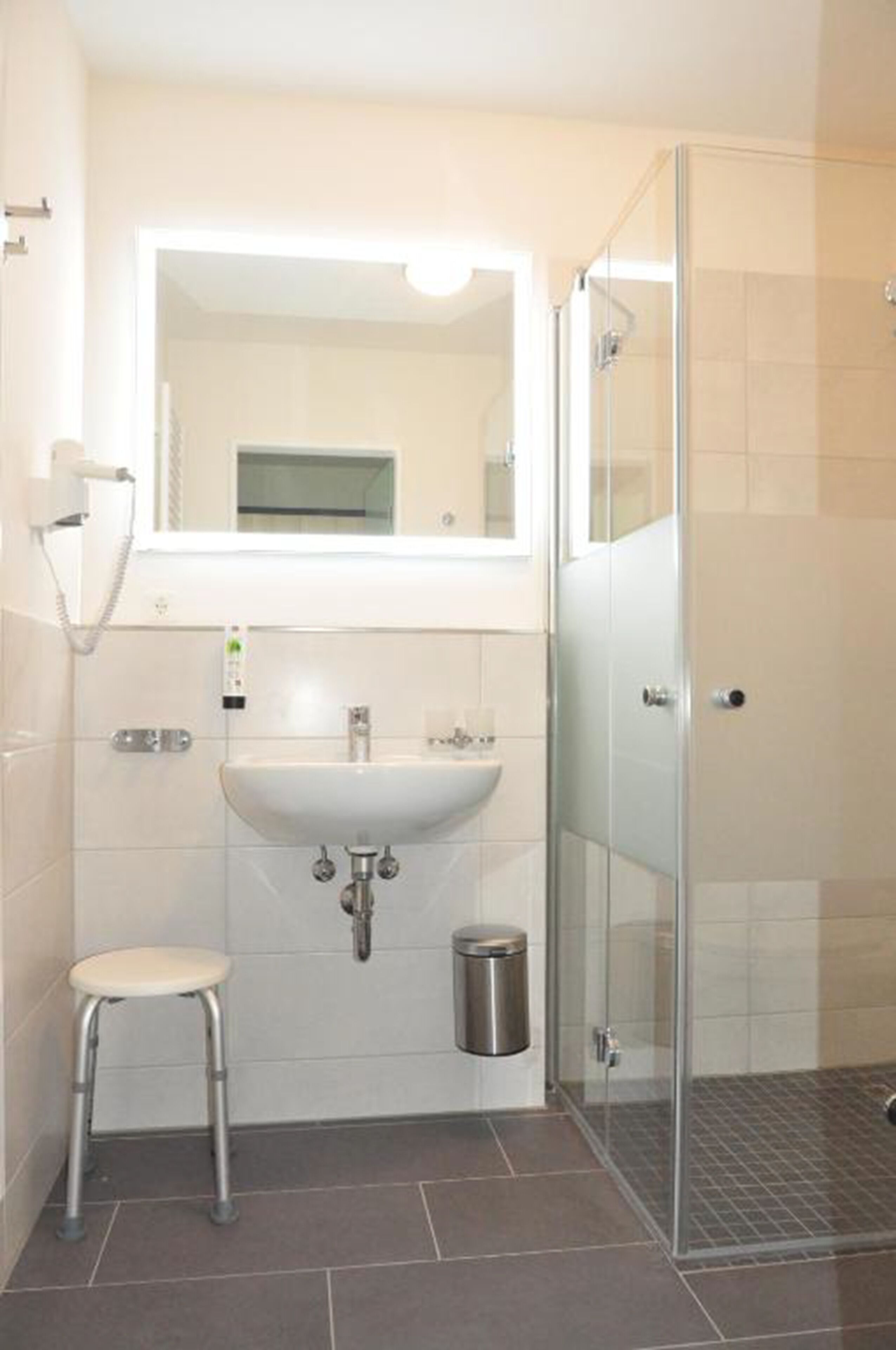 studio | bathroom | shower, hair dryer, towels, soap