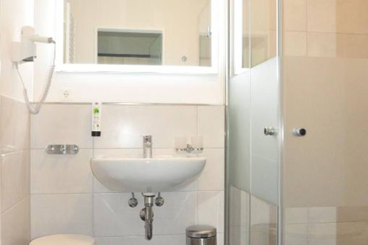 studio | bathroom | shower, hair dryer, towels, soap