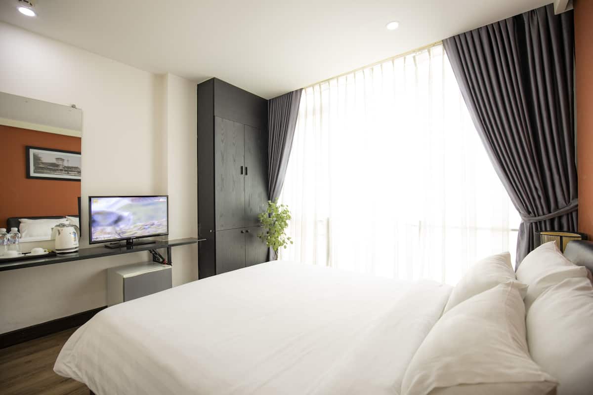 Premium Double Room, City View | 1 bedroom, minibar, in-room safe, desk