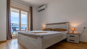 Apartment, 1 Bedroom, Sea View | 1 bedroom, iron/ironing board, WiFi (free), bed sheets - Stay In Budva 1 (Budva)