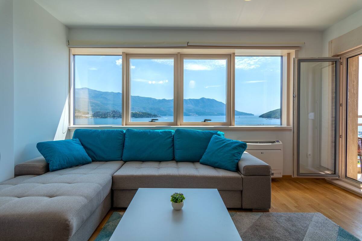Apartment, 1 Bedroom, Sea View | Living area | Flat-screen TV