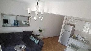 Apartemen, 1 kamar tidur | Area keluarga | TV layar datar