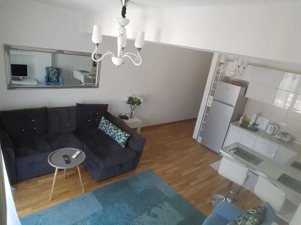 Appartement, 1 chambre | Coin séjour