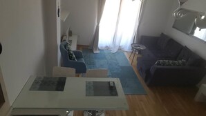 Apartemen, 1 kamar tidur | Area keluarga | TV layar datar