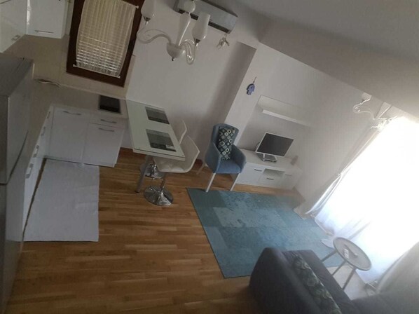 Appartement, 1 chambre | Coin séjour | Télévision à écran plat