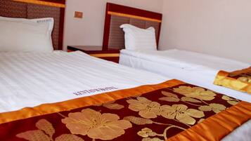 Habitación Deluxe con 2 camas individuales | Sábanas de algodón egipcio y ropa de cama de alta calidad