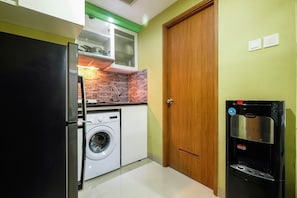 Quarto | Área de estar | TV