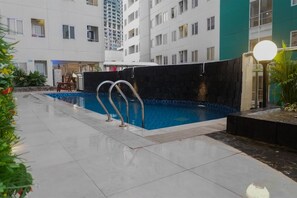 Outdoor pool - Modern Studio Apartment at Pavilion Permata 2 (Surabaya)