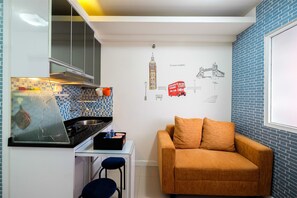 Living area - Comfort 2BR with Pool View Green Pramuka City Apartment (Jakarta)