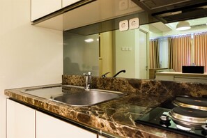 客房 | 私人小型廚房 | 電冰箱、微波爐、爐台、鍋具/餐盤/廚房用品