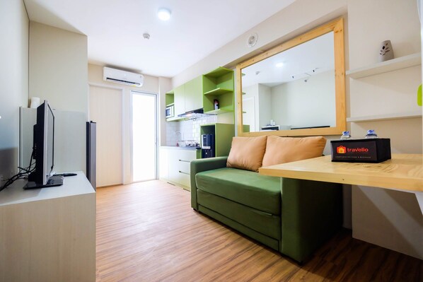 Habitación | Área de sala de estar | Televisión 
