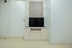 Room | Television - Comfy 2BR Bassura City Apartment Near Bassura Mall (Jakarta)