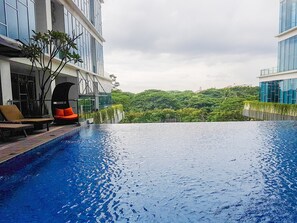Outdoor pool - Cozy 1BR Brooklyn Alam Sutera Apartment (South Tangerang)