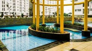 Outdoor pool - Modern and Comfort 2BR Bassura City Apartment (Jakarta)