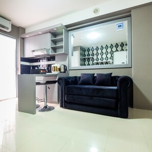 Living area - Modern and Comfort 2BR Bassura City Apartment (Jakarta)
