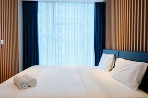 Room | 1 bedroom, desk, free WiFi, bed sheets - Chic 1BR Brooklyn Apartment near IKEA Alam Sutera (South Tangerang)