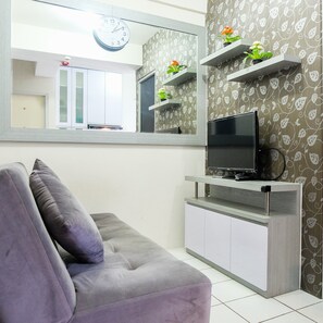 Living room - Minimalist 2BR Pancoran Riverside Apartment (Jakarta)