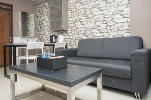Room | Living area | TV - Convenient 2BR at Gateway Pasteur Apartment (Cimahi)