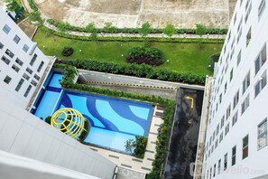 Outdoor pool - Strategic and Cozy 2BR Bassura City Apartment (Jakarta)