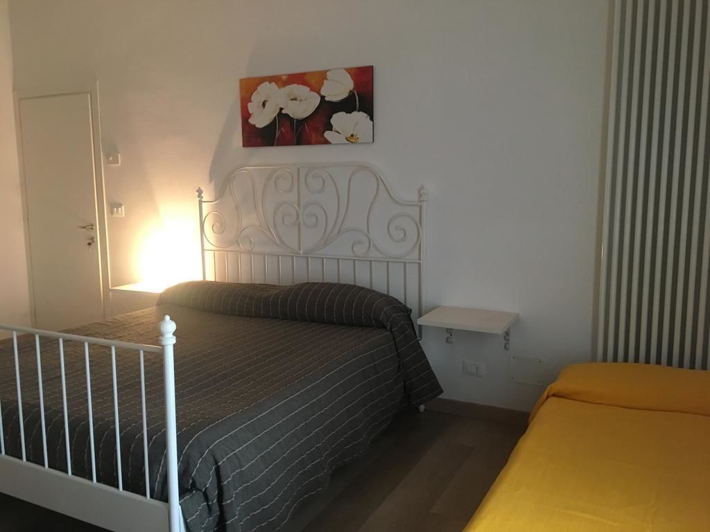 이코노미 쿼드룸, 공용 욕실 | 객실 내 금고, 무료 WiFi, 침대 시트