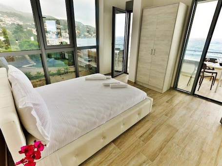 Apartment, 2 Bedrooms, Balcony, Sea View | 1 bedroom, individually decorated, individually furnished, desk