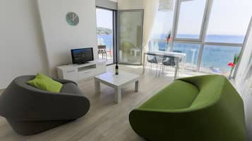 Apartment, 1 Bedroom, Balcony, Sea View | Living room | TV