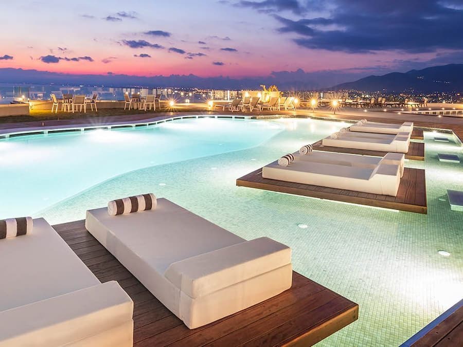 Seasonal outdoor pool, pool umbrellas, pool loungers