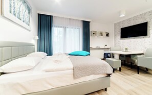 Studio (Sarnia 7/22) | Living area | 30-inch flat-screen TV with cable channels