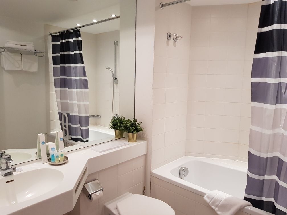 deep-soaking bathtub, free toiletries, hair dryer, towels