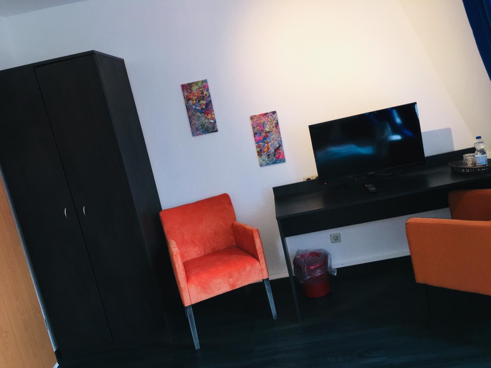 single room | living room | flat-screen tv