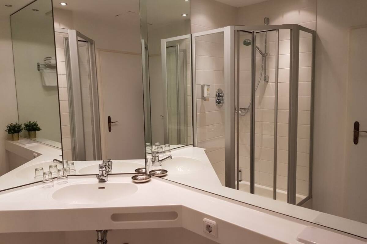 deep-soaking bathtub, free toiletries, hair dryer, towels