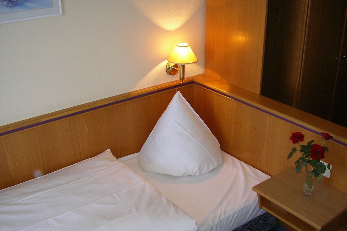 Minibar, desk, blackout curtains, iron/ironing board
