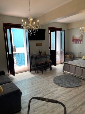 Luxury Studio | Living area | 55-inch Smart TV with digital channels, TV - Casa Of Essence (San Juan)