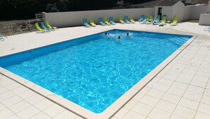 Outdoor pool, open 10:00 AM to 6:30 PM, sun loungers