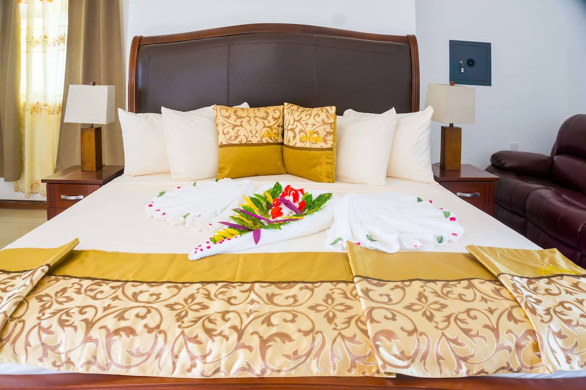 executive room | in-room safe, desk, laptop workspace, blackout curtains