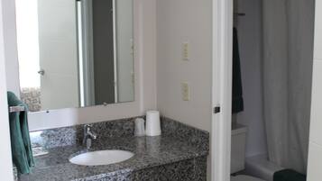 Separate tub and shower, towels